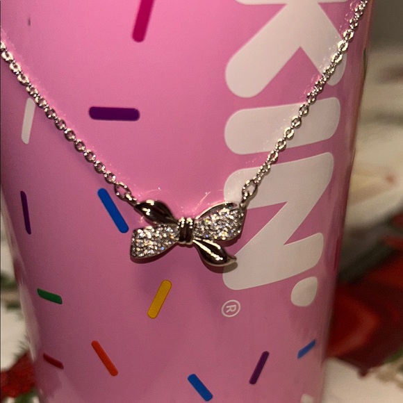 Chic Reversible Silver Bow Necklace with Cubic Zirconia Accent stones. - Picture 3 of 6